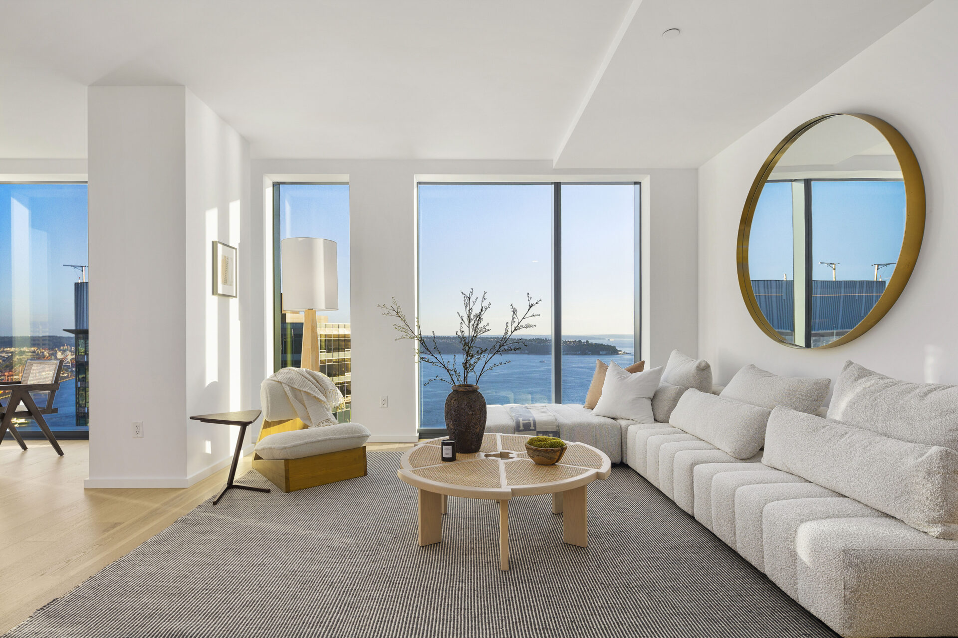 floor to ceiling ocean view living room